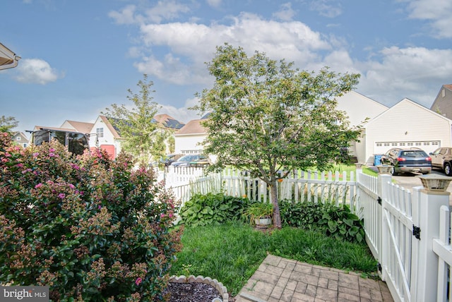 1814 S Pollock Way, Middletown, DE 19709 - fenced yard featuring an attached garage and a residential view
