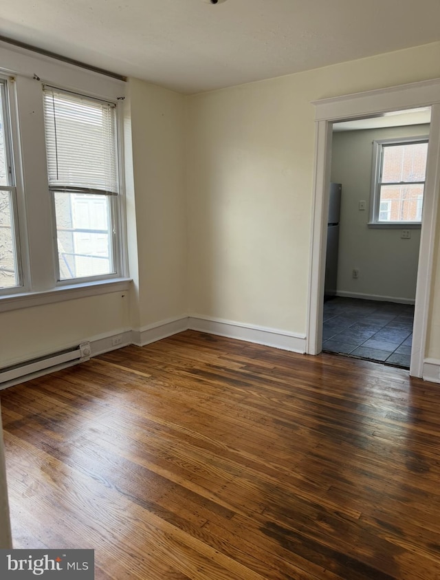 669 Long Ln, Upper Darby, PA 19082 - unfurnished room with wood-type flooring and baseboards