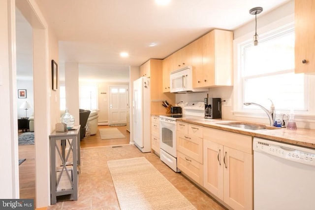 6 W 11th St, Barnegat Light, NJ 08006 - kitchen featuring white appliances, hanging light fixtures, recessed lighting, and a baseboard radiator