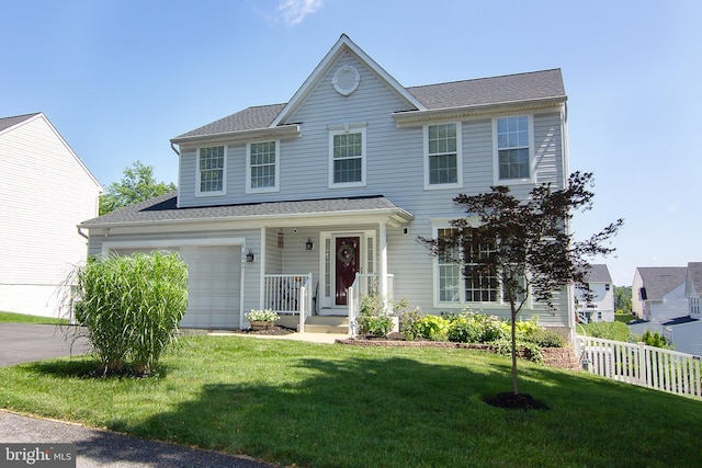 5997 Florey Rd, Hanover, MD 21076 - colonial house featuring driveway and a shingled roof