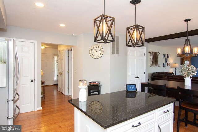 5997 Florey Rd, Hanover, MD 21076 - kitchen featuring freestanding refrigerator, a chandelier, light wood finished floors, white cabinetry, and recessed lighting