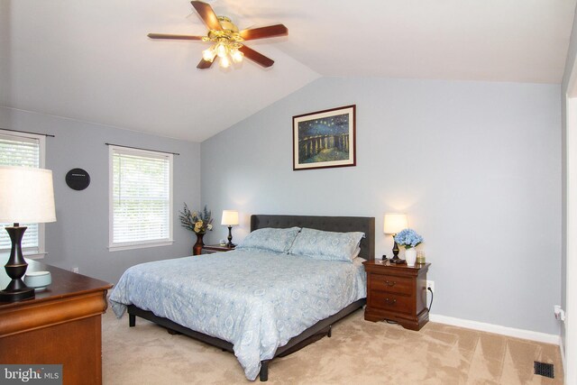 5997 Florey Rd, Hanover, MD 21076 - bedroom with light colored carpet, vaulted ceiling, and a ceiling fan