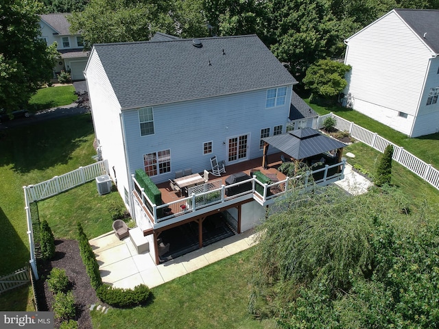 5997 Florey Rd, Hanover, MD 21076 - back of house with a fenced backyard, a wooden deck, roof with shingles, a patio area, and an outdoor hangout area
