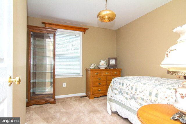 5997 Florey Rd, Hanover, MD 21076 - bedroom featuring light colored carpet and baseboards