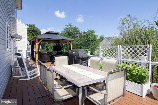 5997 Florey Rd, Hanover, MD 21076 - wooden terrace with a grill, a gazebo, and outdoor dining area