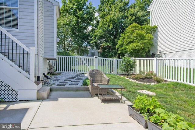 5997 Florey Rd, Hanover, MD 21076 - fenced backyard featuring a patio area