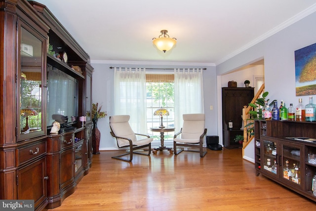 5997 Florey Rd, Hanover, MD 21076 - living area with crown molding and light wood finished floors