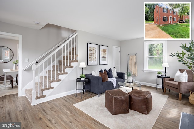 8207 Rockdale Ave, Baltimore, MD 21244 - living room featuring stairway and wood finished floors