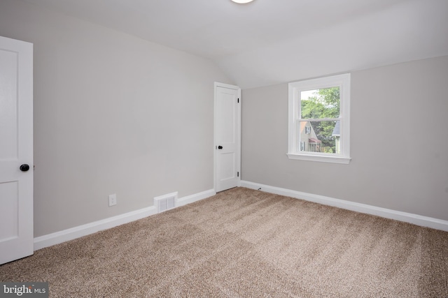 8207 Rockdale Ave, Baltimore, MD 21244 - empty room featuring vaulted ceiling and carpet