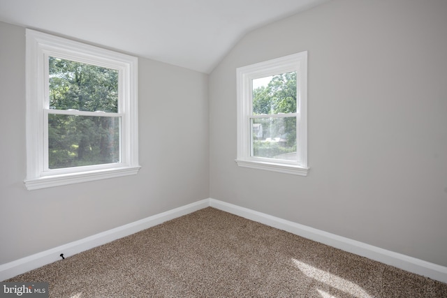 8207 Rockdale Ave, Baltimore, MD 21244 - unfurnished room with lofted ceiling and carpet flooring