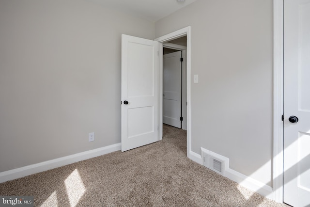 8207 Rockdale Ave, Baltimore, MD 21244 - unfurnished bedroom with carpet flooring and baseboards