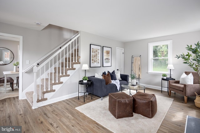 8207 Rockdale Ave, Baltimore, MD 21244 - living room with stairs and wood finished floors