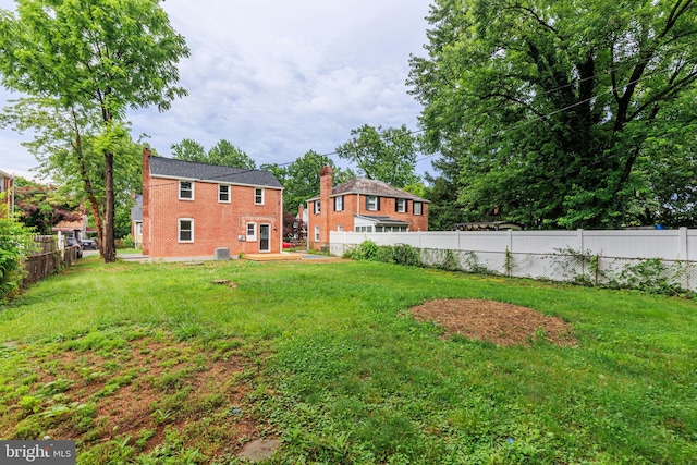 8207 Rockdale Ave, Baltimore, MD 21244 - fenced backyard featuring a patio