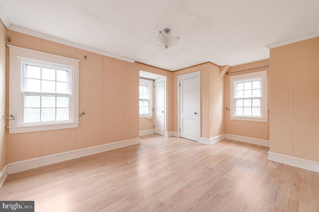 220 N Rolling Rd, Springfield, PA 19064 - empty room with light wood finished floors and crown molding