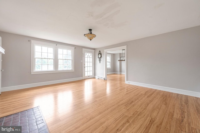220 N Rolling Rd, Springfield, PA 19064 - unfurnished room with light wood-style floors and healthy amount of natural light