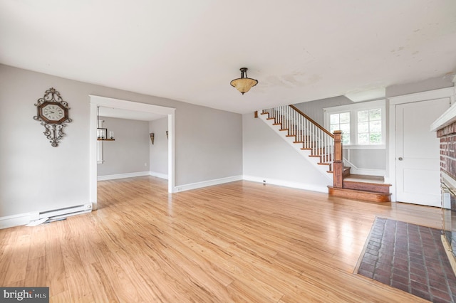 220 N Rolling Rd, Springfield, PA 19064 - entrance foyer featuring stairway, baseboard heating, and light wood finished floors