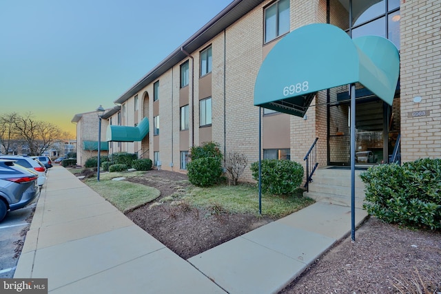 6988 Hanover Pkwy Unit 1, Greenbelt, MD 20770 - view of property at dusk