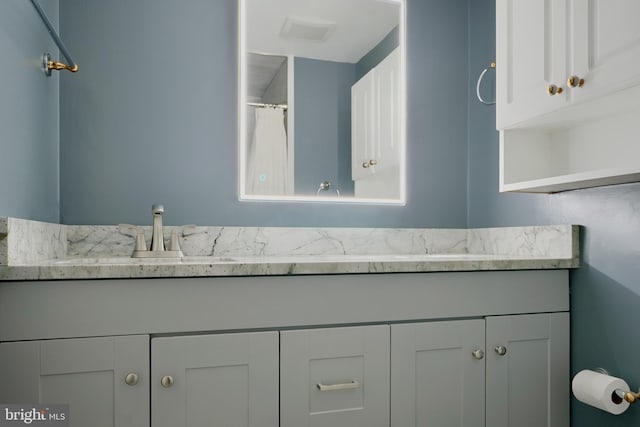 6988 Hanover Pkwy Unit 1, Greenbelt, MD 20770 - full bath featuring vanity and curtained shower