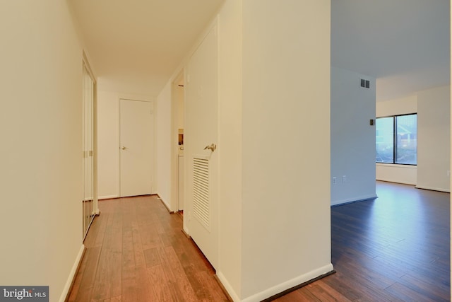 6988 Hanover Pkwy Unit 1, Greenbelt, MD 20770 - corridor featuring wood-type flooring and baseboards