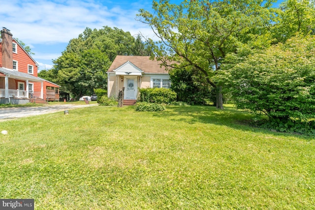 4513 Wards Chapel Rd, Owings Mills, MD 21117 - view of front of house with a front yard