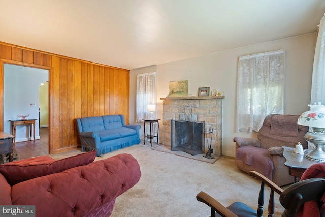 4513 Wards Chapel Rd, Owings Mills, MD 21117 - living room featuring wooden walls and a stone fireplace