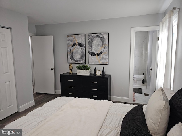 49 Gaylord Cir, Willingboro, NJ 08046 - bedroom with ensuite bath and dark wood-style floors