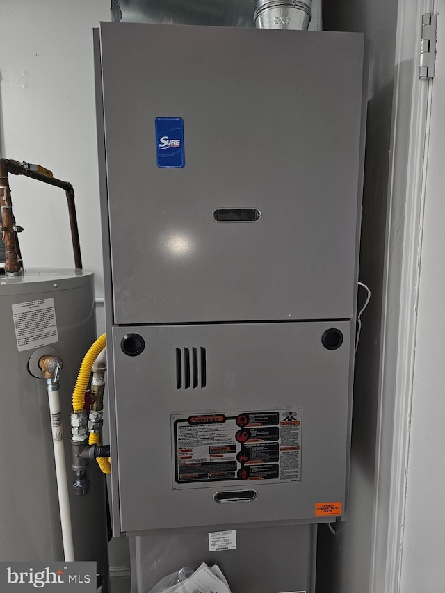 49 Gaylord Cir, Willingboro, NJ 08046 - utility room featuring heating unit and water heater