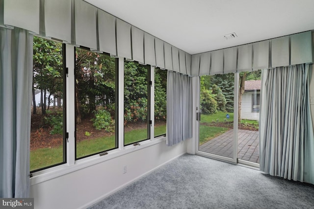231 Valley Forge Dr, Little Egg Harbor Twp, NJ 08087 - unfurnished sunroom featuring healthy amount of natural light and carpet floors