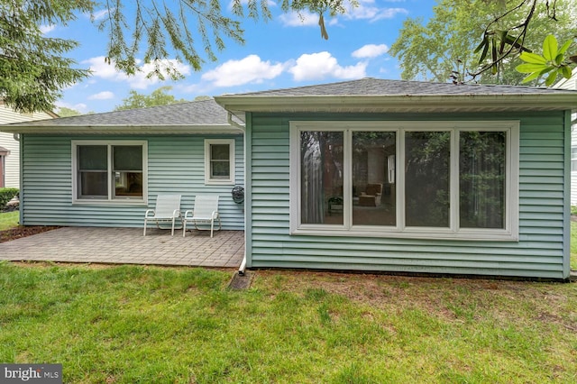 231 Valley Forge Dr, Little Egg Harbor Twp, NJ 08087 - back of house featuring a patio area, a lawn, and a shingled roof