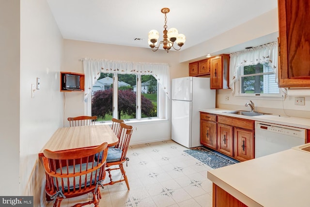 231 Valley Forge Dr, Little Egg Harbor Twp, NJ 08087 - kitchen with white appliances, healthy amount of natural light, and brown cabinets