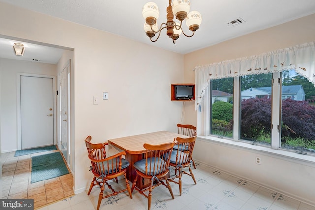 231 Valley Forge Dr, Little Egg Harbor Twp, NJ 08087 - dining room with a chandelier and baseboards