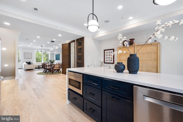 1117 Morse St NE Unit 3, Washington, DC 20002 - kitchen featuring stainless steel appliances, ornamental molding, open floor plan, light countertops, and light wood-type flooring