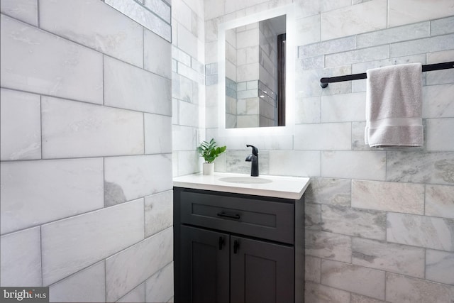 1117 Morse St NE Unit 3, Washington, DC 20002 - bathroom with vanity and tile walls