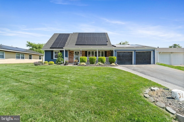 31 Gallaway Ln, Willingboro, NJ 08046 - view of front of home featuring a porch, a front yard, a garage, roof mounted solar panels, and driveway