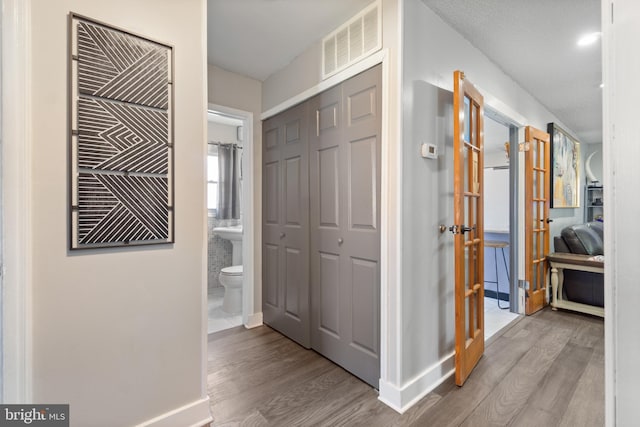 31 Gallaway Ln, Willingboro, NJ 08046 - corridor featuring wood finished floors