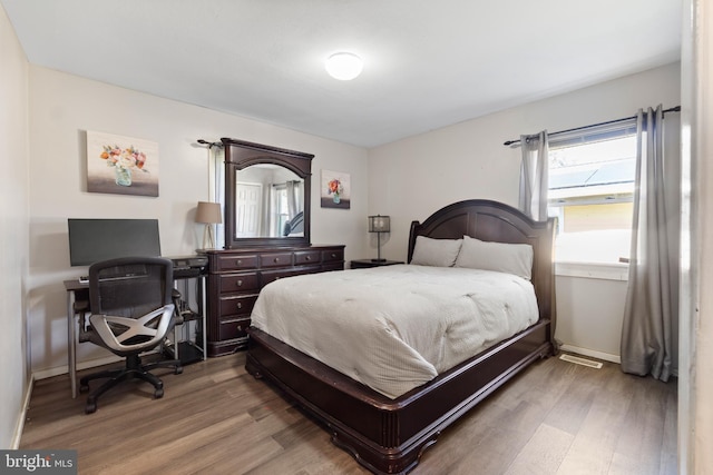31 Gallaway Ln, Willingboro, NJ 08046 - bedroom featuring wood finished floors and an office area