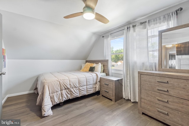 31 Gallaway Ln, Willingboro, NJ 08046 - bedroom featuring vaulted ceiling, wood finished floors, and ceiling fan