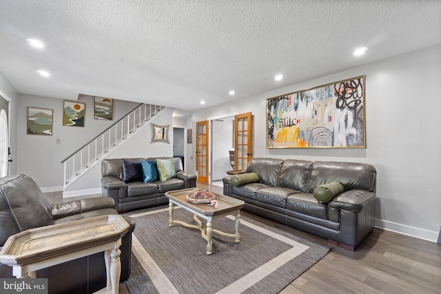31 Gallaway Ln, Willingboro, NJ 08046 - living area featuring recessed lighting, stairs, wood finished floors, and a textured ceiling
