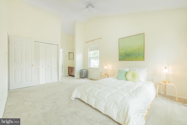 1439 Millikens Bend Rd, Herndon, VA 20170 - carpeted bedroom with high vaulted ceiling, a closet, and ensuite bath