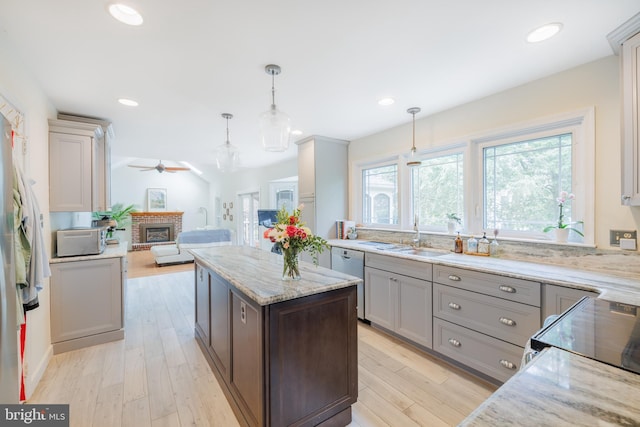 1439 Millikens Bend Rd, Herndon, VA 20170 - kitchen featuring dishwasher, healthy amount of natural light, ceiling fan, light stone countertops, and recessed lighting