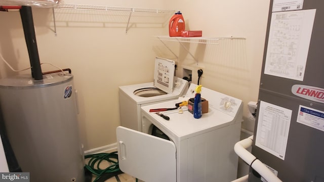 1288 Ox Rd Unit D, Woodstock, VA 22664 - laundry area featuring washer and dryer, heating unit, and water heater