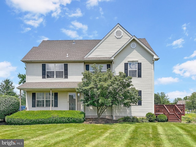 2408 Carriage Ln, Royersford, PA 19468 - traditional-style house with a front yard and a wooden deck