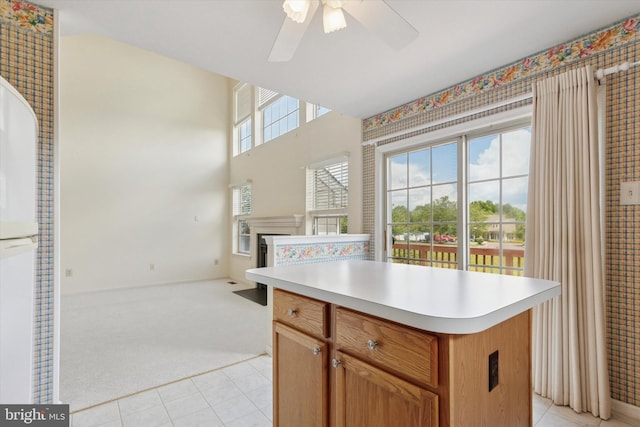 2408 Carriage Ln, Royersford, PA 19468 - kitchen featuring light colored carpet, light countertops, open floor plan, and ceiling fan