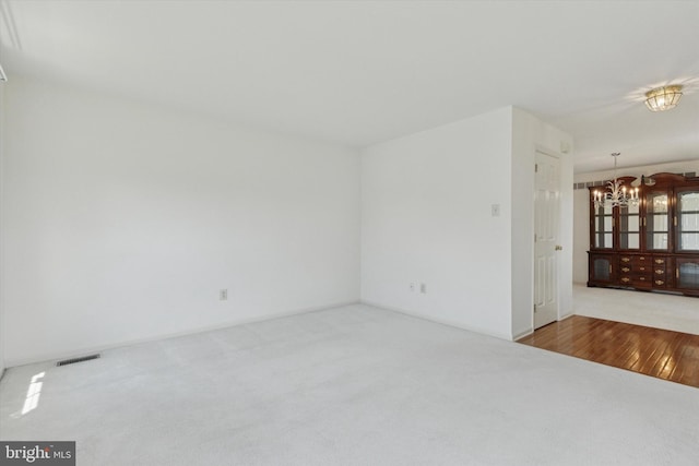 2408 Carriage Ln, Royersford, PA 19468 - empty room with a chandelier and carpet