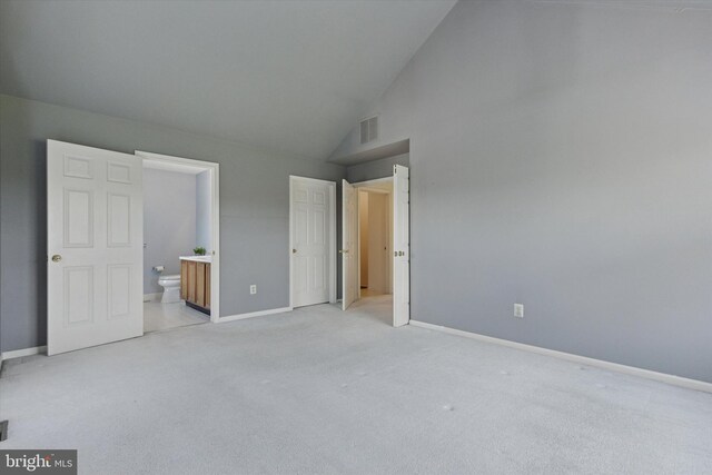 2408 Carriage Ln, Royersford, PA 19468 - unfurnished bedroom featuring ensuite bathroom, light colored carpet, and high vaulted ceiling