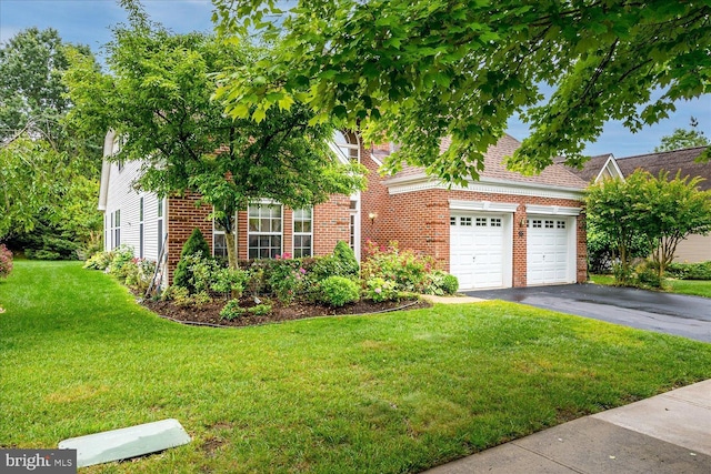 16 Monte Carlo Dr, Hamilton, NJ 08691 - obstructed view of property featuring asphalt driveway, brick siding, a front lawn, and a garage