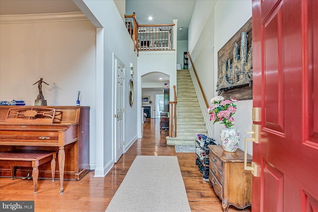 16 Monte Carlo Dr, Hamilton, NJ 08691 - entrance foyer featuring arched walkways, stairs, wood finished floors, and crown molding