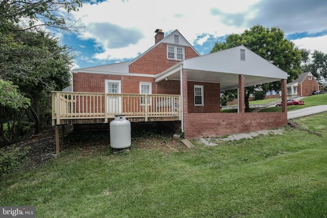 830 William St, Front Royal, VA 22630 - rear view of house with brick siding, a yard, a chimney, and a deck