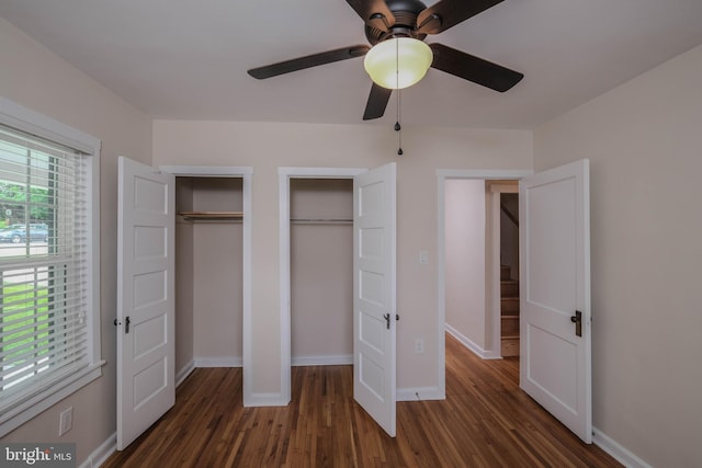 830 William St, Front Royal, VA 22630 - unfurnished bedroom featuring multiple closets, wood finished floors, and a ceiling fan