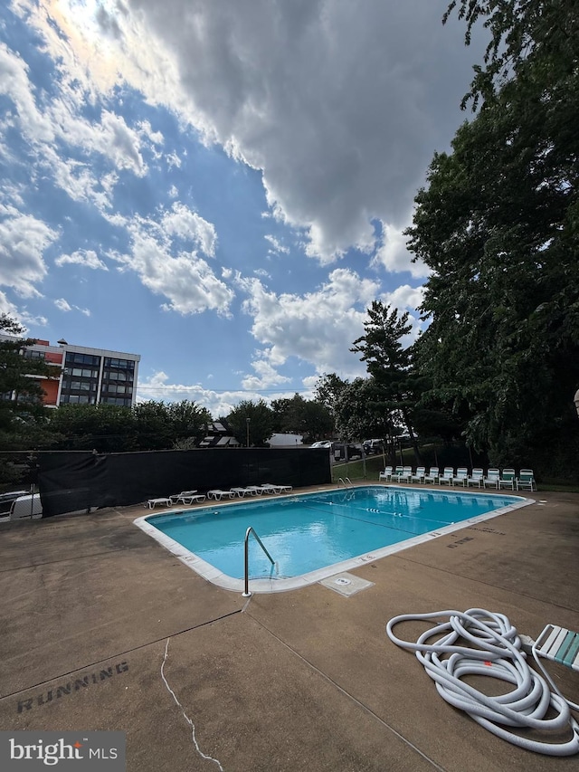 5565 Columbia Pike Unit 210, Arlington, VA 22204 - community pool featuring a patio